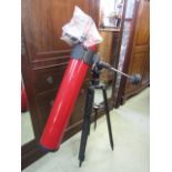 A Tasco Power Reflector Telescope together with a book - Frontiers of Astronomy by Fred Hoyle