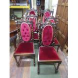 A set of six (4 & 2) Edwardian oak dining chairs in the Carolean style with barley twist and other