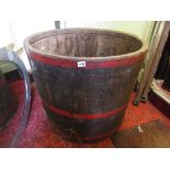 A substantial circular coopered oak tub, 80 cm diameter approx