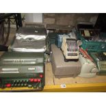 An interesting collection of vintage calculating machines by Comptometer plus Add Master Numeria and