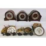 The contents of a clock maker's workshop to include bells, movements, cases, vintage mantel clocks