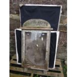 A teakwood notice board with glazed front for St Mary's church and three mirror panelled doors,