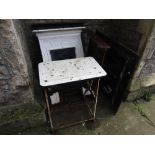 Four Victorian cast iron fire places with decorative finish and a small enamelled topped mangle
