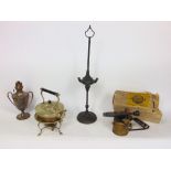 A mixed metalware lot to include a silver plated oil lamp in the form of a twin handled trophy,