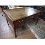 A 19th century mahogany partners desk/writing table, each main side fitted with five drawers