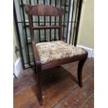 A set of five Regency mahogany dining chairs (4&1) with rope twist splats, reeded frames raised on