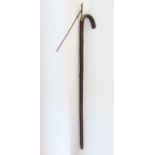 A horse measuring stick fitted with a steel ruler and spirit level.