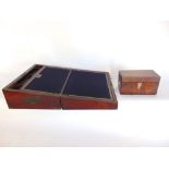 A 19th century rosewood writing slope, the hinged lid enclosing a baize lined and fitted interior.