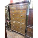 A George III mahogany chest on chest, six long and two short graduated drawers beneath a dentil