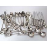 A collection of various silver plated flatware