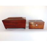 A 19th century mahogany sarcophagus tea caddy, the hinged lid enclosing a fitted interior together