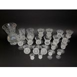 A large collection of cut and etched Edinburgh thistle glass wares to include a larger vase, other