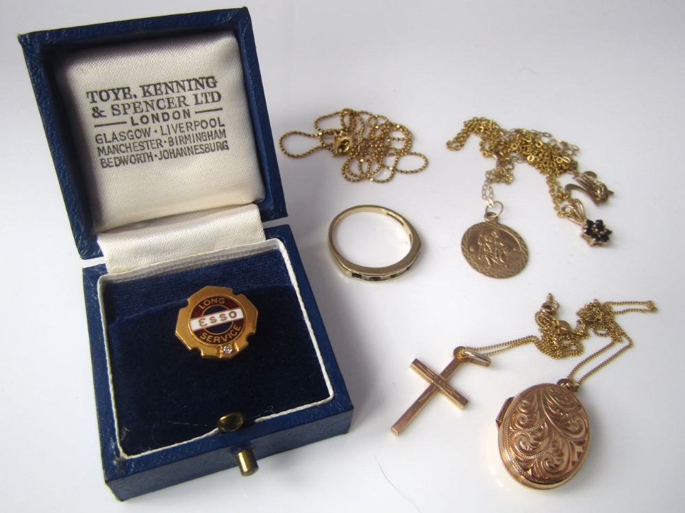 A 9ct Esso long service lapel badge set with a diamond and in original box, together with four