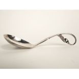 A George Jensen Danish silver pattern 21 preserve spoon with planished bowl, 13.5cm long
