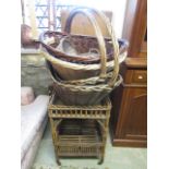 A quantity of wicker baskets of various sizes, further patterned two tier stand