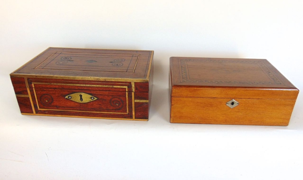 An eastern hardwood and brass inlaid work box together with a further parquetry writing slope (2).