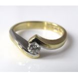 An 18ct white and yellow gold diamond ring, 0.20cts approx, size N/O, 5g