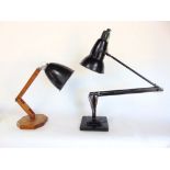 A Herbert Terry Anglepoise lamp upon a stepped square base together with a further Mac lamp type