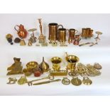 A box of mixed 19th century and later brass wares including Victorian weights, pestle and mortars,