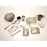 A mixed collection of silver to include two cigarette cases, silver salt, egg cup, twin handled