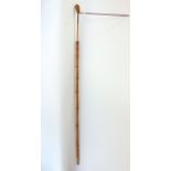 A good bamboo and hawthorn horse measuring stick fitted with a ruler and spirit level.