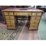 A 19th century mahogany floral marquetry desk by Edwards and Roberts with satinwood stringing and