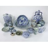 A quantity of oriental blue and white ceramics including a two handled moon flask type vase with