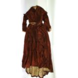 A collection of ladies clothing including two piece Victorian outfit in brown taffeta, black dress