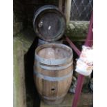 Three old coopered spirit barrels, 50 cm high