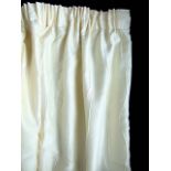 Two pairs of lined curtains, ivory coloured with pencil pleat heading and matching tie backs,