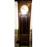 An art Deco oak three train longcase clock with anodised dial with Westminster chime fitting