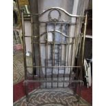 A single brass bedstead with square cut rails beneath mushroom finial's