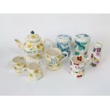 A collection of Emma Bridgewater wares comprising a tea pot and cover in the yellow wallflower