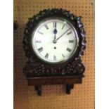 An 8 inch dial single fusee wall clock, fine English carved wall and bracket, carved with leaves and