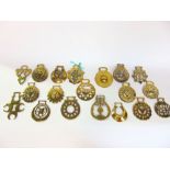 Nineteen 19th century horse brasses with traditional geometric and other detail