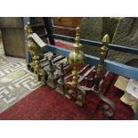 A pair of 19th century brass and iron andirons with bulbous stems and scrolled feet together with