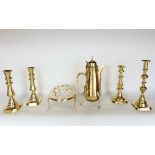 A mixed collection of brassware to include a pair of baluster brass candlesticks, two further