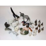 A collection of mainly USSR ceramic animals and birds including a magpie, two polar bears,