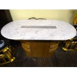 An Art Deco style low centre table, the oval decorative white, grey, flecked and veined marble top