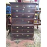 A Georgian mahogany chest on chest, six long and two short graduated drawers with brass plate