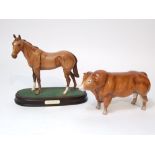 A Royal Doulton matt glazed model of racehorse Mr Frisk, raised on an oval wooden base, together