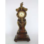 A miniature continental fruitwood long case clock, with cast ormolu mounts and 2 inch dial, fitted