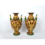 A pair of large and unusual 19th century two handled vases by Minton & Co with yellow slip