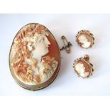 A good quality cameo brooch in 9ct mount with safety chain and a pair of cameo earrings with screw