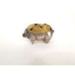 A silver pin cushion in the form of a pig with cushioned back, Birmingham 1905