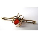 A 15ct gold bar brooch in the form of a spider, 8g