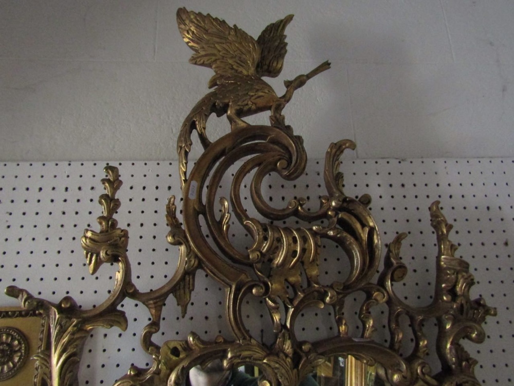 A Rococo style gilded pier glass with shaped, pierced and detailed frame with 'C' scroll, acanthus - Image 2 of 3