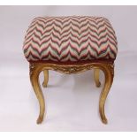 A good quality mid 19th century English centre stool with original gilded framework raised on four