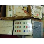 A box containing a collection of Royal Mail Mint stamp collections, London 2012 Team GB Gold Medal