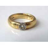 An 18ct bezel set diamond ring 0.25cts approx, size M, 8g